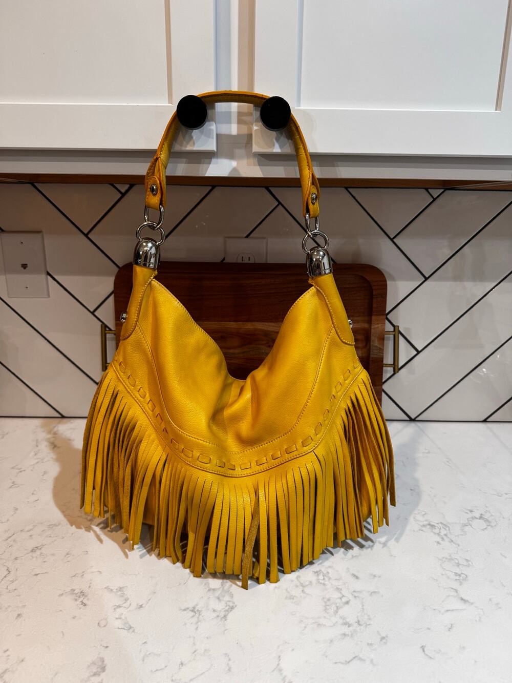 B. Makowsky yellow leather slouchy hobo bag silver-tone hardware fringe accents
